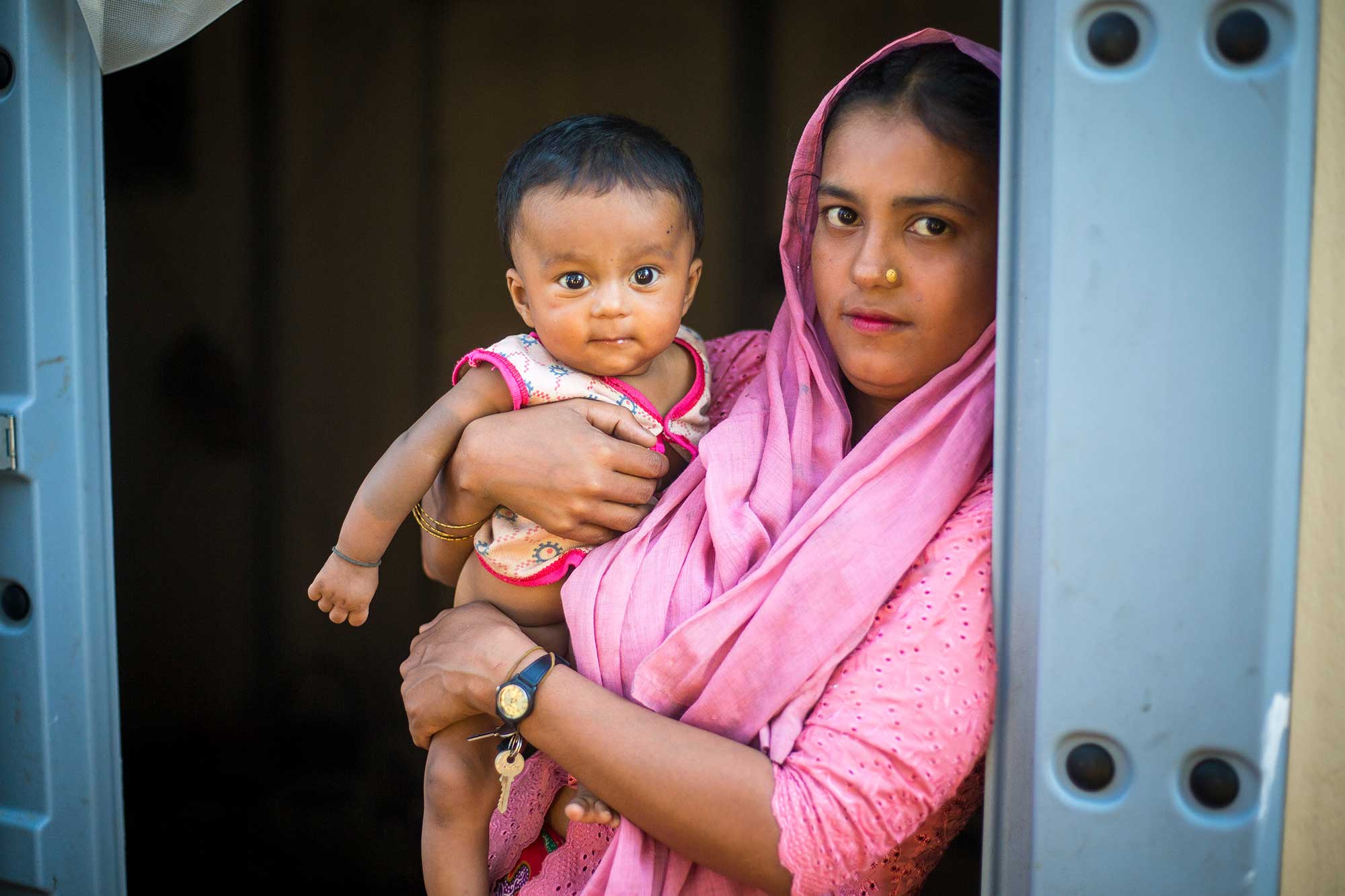 A newly arrived Rohingya family from Myanmar, including Hajira Khatun, 22, and Sadeka, 3 months